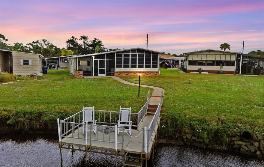 Welcome to 142 Lazy River Rd, a place where every day feels like a vacation and life moves to the rhythm of the water.
Tucked along a peaceful canal just seconds from the Myakka River, this beautifully cared-for home is fully furnished and move-in ready. From the moment you arrive, you’ll feel the calm of a waterfront lifestyle waiting to unfold. Imagine mornings that begin with coffee in the lanai and evenings spent watching soft golden light dance across the water.
Step inside and take in the light, open feel that makes this home so inviting. The expansive Florida room along the back of your home has vaulted ceilings captures panoramic canal and lake views, creating a serene space to read, relax, or host sunset get-togethers with friends.
Every detail has been thoughtfully updated. The roof, AC, and carport were replaced in 2018, entire carport/porch screened in in 2024, and the flooring throughout has been upgraded to luxury vinyl with ceramic tile in the kitchen and baths. Master/Primary suite has an updated ensuite bath with a rain showerhead and bench seating in your lovely all-tile walk-in shower. Both bedrooms include walk-in closets, and the spacious kitchen features a pantry, breakfast bar, and plenty of cabinet space for those who love to cook or entertain. Soft neutral tones and coastal finishes make the entire home feel crisp, comfortable, and effortlessly Florida.
Outside, there’s room to breathe and enjoy. The widened driveway, two storage sheds (one with a washer/dryer), and patio space make it easy to host a barbecue, tinker on a project, or simply relax after a day on the water. Don't forget the roll down sunshades to block sun or just create additional privacy to enjoy all that this intimate screened-in and covered space has to offer!
Lazy River Village is one of Southwest Florida’s most sought-after 55+ waterfront communities, known for its warm spirit and endless opportunities to stay active. Residents enjoy pickleball, tennis, shuffleboard, putting greens, a heated pool, fitness center, kayak launch, woodworking shop, and a marina with 38 boat slips available for rent. There’s even storage for your RV, trailer, or boat, so you can bring every bit of your Florida lifestyle with you.
Low monthly fee includes lawn care, cable, and internet, keeping your days simple and stress-free. And when you’re ready to explore beyond the neighborhood, you’re just minutes from Downtown Wellen Park, CoolToday Park (home of the Atlanta Braves), Warm Mineral Springs, and the white-sand beaches that make this area famous.
Whether you’re dreaming of a sunny winter escape, a full-time retreat, or the perfect place to slow down and savor every day, 142 Lazy River Rd offers the best of waterfront living, comfort, and connection. It’s not just a home—it’s the Florida lifestyle you’ve been waiting for!!