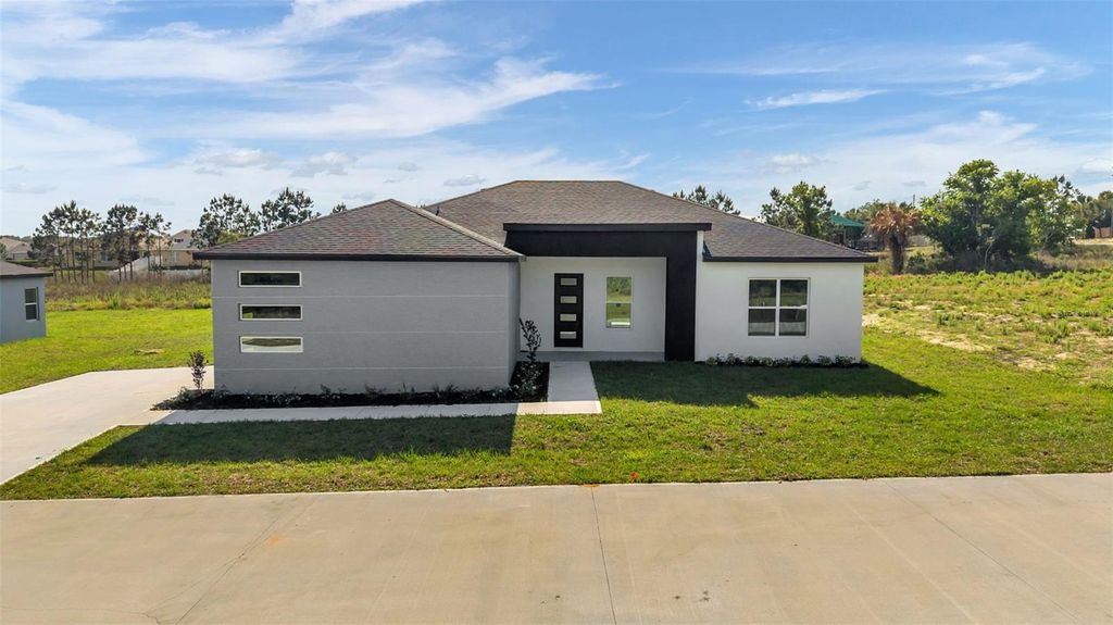 Photo of 1483 Holly Hill Road, Davenport, FL 33837 (MLS # L4961871)