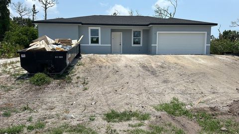 Photo of 11369 Gulfstream Boulevard, Port Charlotte, FL 33981 (MLS # TB8389009)