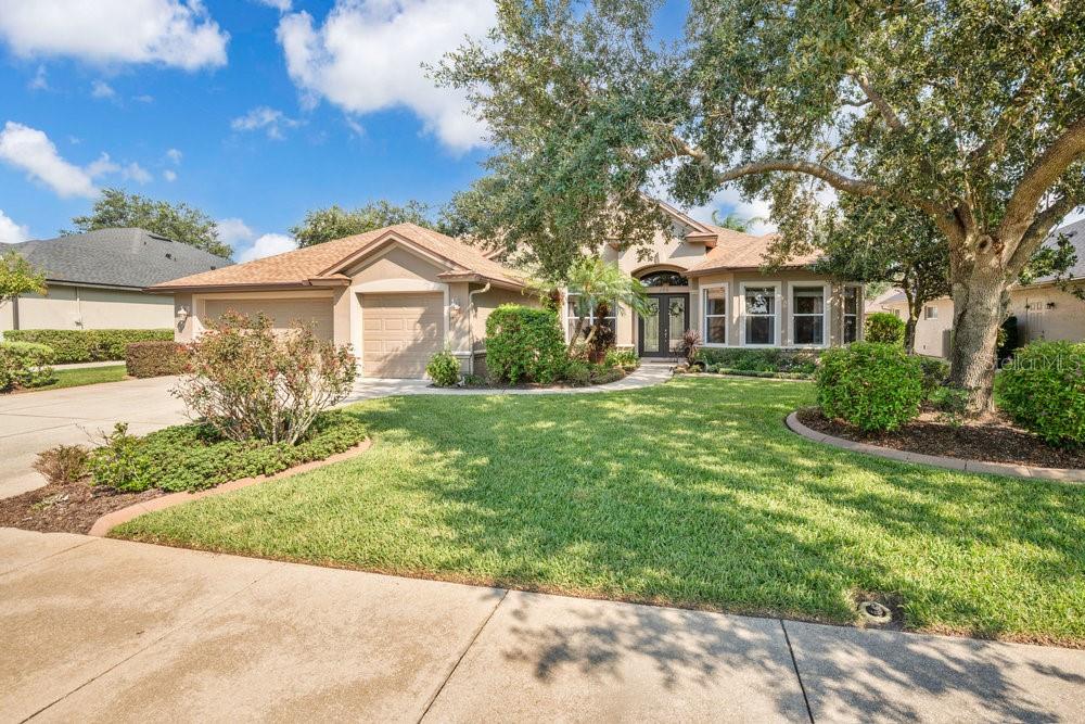 Welcome to your next home in the GATED community of HAMPTON HILLS ESTATES (HHE), located within DEBARY PLANTATION, home of DEBARY COUNTRY CLUB! This immaculate home offers a perfect blend of quality construction, comfort, tastefulness and convenience, making it an exceptional opportunity for homebuyers seeking a true Florida Lifestyle in a prime location. This property offers 3 spacious Bedrooms, 2 full Bathrooms and a separate OFFICE with glass French doors. The master suite is spacious, with a generously sized walk-in closet, a luxurious shower, a garden tub and dual sinks for added convenience. This open floor plan home is designed to provide the peace and tranquility one desires when one walks into their home. The entrance brings you into a GREAT ROOM with a FIREPLACE and a view of a covered LANAI and the Salt Water SWIMMING POOL which is a beautiful focal point that has both Solar and Gas heating options. There are high ceilings throughout as well as plenty of windows and doors that bathe the house in beautiful, natural light. The oversized 3 CAR GARAGE allows space for additional vehicles, storage and/or a work shop. With a NEWER ROOF and fresh paint throughout, this home is ready for you to make it your HOME. Being a resident of DeBary Plantation means embracing a lifestyle of leisure and an ESTABLISHED community feel with Larger Lot Sizes and Mature Trees that NEW HOME builders CANNOT offer. At the heart of the neighborhood is the prestigious DeBary Country Club, home to an 18-hole GOLF COURSE with a 4-star rating from Golf Digest and a history of hosting U.S. Open Qualifiers. The course offers a challenging yet scenic experience, set against a backdrop reminiscent of the Carolinas with minimal water hazards and natural elevation changes. Beyond golf, club members have access to a range of amenities, including TENNIS and PICKLE BALL courts, an OLYMPIC size swimming pool, and state-of-the-art FITNESS facilities. The club’s INNOVATIONS BAR & GRILLE provides exquisite dining options, perfect for socializing or celebrating special occasions. Beyond the community, DeBary itself offers an exceptional quality of life. With the DeBary SunRail station, Gateway Center for the Arts, numerous parks, scenic trails, and breathtaking natural springs, outdoor enthusiasts will find plenty to explore. DeBary’s prime location provides easy access to I-4, top-tier shopping, the SunRail Commuter Rail, and the St. John’s River boat ramp. Whether you're heading to the stunning East Coast beaches or Orlando International Airport, both are just a short drive away. Don’t miss this incredible opportunity to own a home in one of Central Florida’s best-kept secrets. Click the VIRTUAL TOUR button to experience a 3D HOME WALK-THROUGH, then schedule your private showing today before this gem is gone!