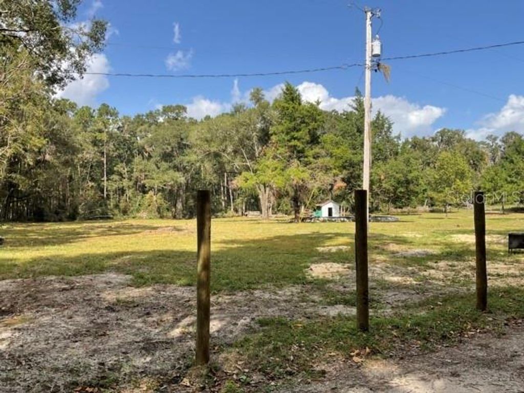 Photo of 5542 SW 57th Avenue, Gainesville, FL 32608 (MLS # GC536750)