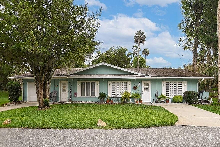 Welcome to easy Florida living in the charming deed restricted community of Country Club Chalet in New Smyrna Beach! This beautifully updated home features stylish LVP flooring throughout, updated baseboards and cabinetry, beautifully tiled kitchen and baths, plantation shutters, and a screened porch perfect for enjoying your private garden setting. One of the biggest advantages? The incredibly affordable $372/month HOA fee covers exterior maintenance including roof, paint, and yard care -- plus valuable extras like Wi-Fi and cable TV. Enjoy low-maintenance living just minutes from everything we love about New Smyrna Beach: Golf, Beach, Canal Street Historic District and Flagler Avenue on the Beachside.
