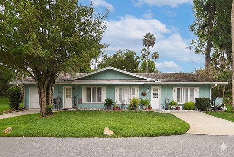 Photo of 23 Country Club Drive #A, New Smyrna Beach, FL 32168 (MLS # NS1088223)