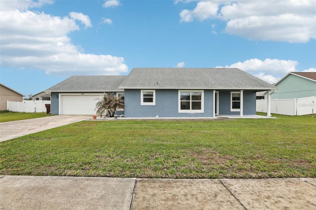 Photo of 264 Chicago Avenue W, Haines City, FL 33844 (MLS # O6396679)