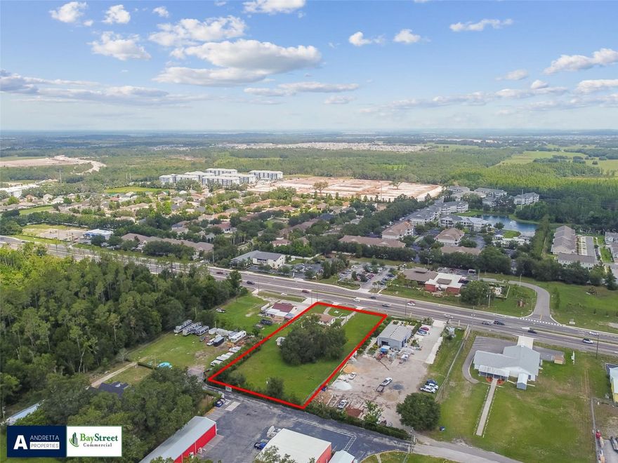 This 1.3 acre C-2 (general commercial) zoned parcel is fully fenced and has outstanding visibility and access along busy SR-54 in the heart of Wesley Chapel. The large tract is perfect for retail users who need an abundance of parking such as car dealerships, RV / boat dealerships, or redevelopers for national QSR concepts similar to those that already operate nearby. Currently, the site contains two structures; a main office of 1,320 SF and a rear storage building w/HVAC. Nearby businesses include The New River Library, a Pasco County Public Library,  Home Depot, Publix, McDonalds, Wendy's, Suncoast, schools, and many others. The Meadow Point Subdivision featuring more than 3,000 homes is located a five minute drive to the west. 
Traffic Count: 32,500 VPD
Disclaimer: All references to potential development are based upon Future Land Use in the municipal development code. Brokers make no representations as to allowable use or development limits. Purchaser should consult professionals and the local municipality to determine property suitability.

Located in Wesley Chapel just east of I-75 and close to 301, offering easy access to surrounding areas.