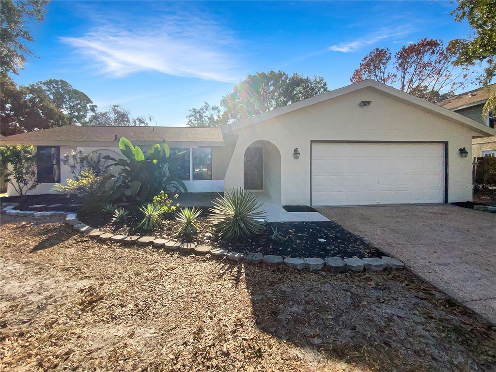 Photo of 10328 Turkey Oak Drive, New Port Richey, FL 34654 (MLS # TB8455080)