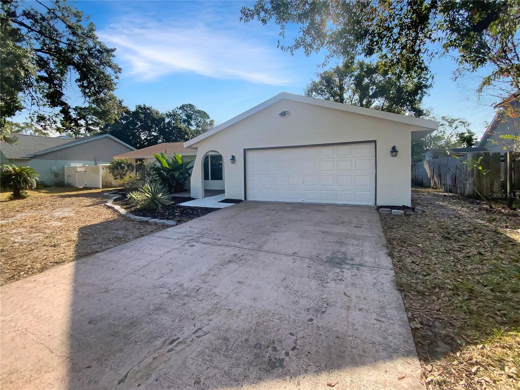 Photo of 10328 Turkey Oak Drive, New Port Richey, FL 34654 (MLS # TB8455080)