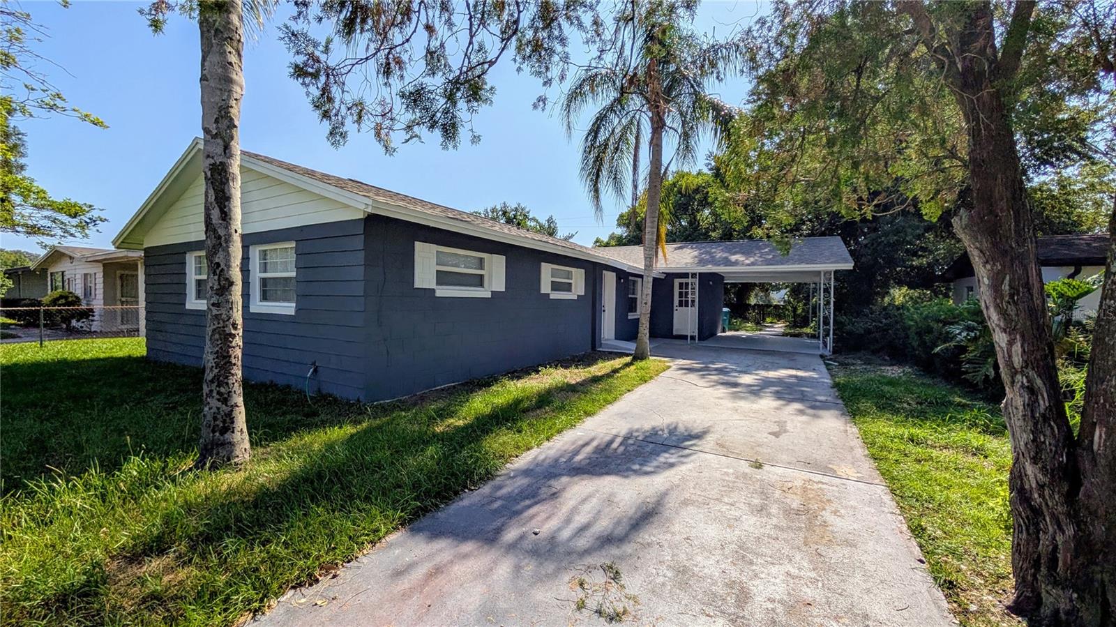 Completely Remodeled 2025 | 2025 NEW ROOF | New LVP Flooring Throughout | Brand NEW Kitchen with Brand New Appliances | Granite Countertops | NEW Exterior and Interior Paint | NO HOA | Step into your dream home! This 3-bedroom, 2-bathroom home, meticulously remodeled in 2025, exudes modern elegance while offering ultimate comfort. Ideally situated in Orlando, you'll enjoy unparalleled convenience. Completely remodeled with a spacious layout: With 3 bedrooms and 2 bathrooms, you have ample space for family and guests.
2025 Brand New Roof: Enjoy peace of mind with a completely new roofing system.
Brand New Interior and Exterior Paint: Fresh, modern colors create a welcoming atmosphere from the moment you arrive.
New LVP Flooring Throughout: Stylish and durable luxury vinyl plank flooring offers a cohesive and modern look.
Gourmet Kitchen & Spa-like Bathrooms: Both the kitchen and bathrooms boast new granite countertops, and brand new cabinets. The bathrooms are bright modern spaces with beautiful black accent accessories and designer-inspired tile. The kitchen features a stunning and spacious peninsula island, and all brand new appliances for your convenience.
Flexible Dining Options: Choose between casual meals at the kitchen peninsula island or more formal gatherings in the dedicated dining room.
Outdoor Living: A patio accessible via a brand-new sliding glass door off the dining room, perfect for entertaining or relaxing. Enjoy your spacious backyard.
Ample Storage & Utility: A dedicated utility room with its own exterior entrance connects seamlessly to the laundry room and kitchen, providing generous storage space.
Thoughtful Details: Each bedroom is equipped with a brand-new ceiling fan for added comfort.
Extended Driveway & Carport: An extra-long driveway leads to a covered carport, offering plenty of parking and protection. With quick access to both the front door and the utility room entrance, making unloading groceries and doing errands a breeze.
Buyer/Buyer's Agent to verify room measurements.