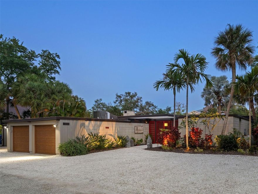 Located on a quiet lane on Siesta Key, this beautiful waterfront home is a RARE OPPORTUNITY TO OWN A SARASOTA SCHOOL OF ARCHITECTURE LEGACY! Designed by the Father of Sarasota School of Architecture, Ralph Twitchell, in 1960 when he had perfected his homes for Florida living. Like many homes of the era, this residence lives much larger than its square footage would imply, as there are many screened areas, breezeways, and covered spaces. Entering the home through ornamental red gates, you are in a covered foyer breezeway with a flowing koi pond beside your feet. Instantly your senses become calm as your view moves through to palm trees and sailboat water. With two distinctly different home structures (the guest area and main living area), the guest structure has 2 bedrooms and a bathroom that open to the back lanai, hot tub, second koi pond and to water views beyond. The main living area has expansive sliding glass doors and clerestory windows, exposed beams and continuous pecky cypress wood ceilings that extend outside to the beautiful pool oasis and sailboat water with views leading out to Sarasota bay. The integrity of the MID-CENTURY-MODERN aesthetics immerse you in the space with its Ocala block walls, terrazzo floors, cypress walls and inviting wood burning fireplace. The kitchen has been tastefully updated with birch cabinetry & granite counters that open to the living space with a large open bar top. There is a quaint outside screened dining patio between the kitchen and garage that opens up to views of the sky. The primary suite has maintained the mid-century modern look with many built-in closets and dressers, as well as a floating birch counter in the bathroom. There is an accessory building on the property that features a spa-like atmosphere with cork flooring and a full size cedar sauna enclosed within the space. The southern facing pool area has an extended roof line providing sunshade, and a constant light show where sunlight reflects and dances tranquilly from the canal and pool. The shelled yard leads you to many outdoor spaces under shaded palm trees, 131’ of new seawall, a dock and boat lift. Close to Siesta Key beach accesses, and many restaurant choices just down the road, this home is a one-of-a-kind opportunity. Perfect for those who love nature, love Siesta Key, love architecture, and want to buy a piece of history!