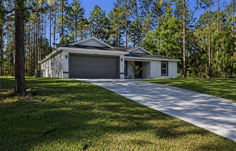 Photo of 1940 W Quaker Lane, Citrus Springs, FL 34434 (MLS # OM723123)