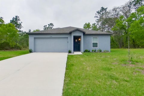 Photo of 6978 N Dade Point, Citrus Springs, FL 34433 (MLS # O6452245)