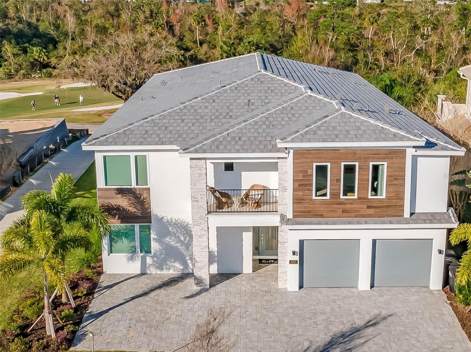 Step into an undisputed jewel of Resort Vacation homes. This 10 bedroom 12.5 bath luxurious resort vacation home, located just moments from the world of Disney, stands alone in its class.
Professionally decorated with high end luxury designer upgrades and custom touches, this fully furnished and themed vacation home is to the highest tastes. The open concept home is positioned on an Oversized golf lot overlooking the Signature Jack Nicklaus 13th green. As you enter the home, the foyer leads past 4 primary bedrooms to a generous great room living area and kitchen. Upon entering the space, you look straight to the expansive pool area, as it is greeting and inviting you in! Opening to the covered lanai, the summer kitchen, gas grill, oversized infinity pool, spillover spa, sun shelf, and an expansive Travertine adorned pooldeck is equipped with a separate step down gas fire pit sitting area that will keep everyone engaged for many days and sunset nights! The second floor invites you up to a luxurious loft complete with tv lounge area, pool table and wet bar just outside the elegantly designed home theatre. Overlooking the oversized pooldeck and the 13th green of the Nicklaus golf course from the covered rear balcony puts many an owner and guest at ease! You and your guests will find six bedrooms including two master bedroom suites, two individual bedrooms, and 2 extra large themed bunk rooms - each with two full bathrooms and four bunkbeds a piece -uniquely designed with a captivating princess-theme and superhero room. A separate large arcade game room off the 1st floor foyer is equipped with a basketball shooting game, skeet ball, an air hockey table, and individual driving games for endless fun and entertainment for all!
This home comes with a TRANSFERABLE REUNION MEMBERSHIP! This sought-after perk not only amplifies the allure for potential renters, craving exclusive community experiences and amenities. For the discerning investor, this property is already equipped with future bookings in place from the first day of ownership. Guests are irresistibly drawn to the outdoor pool, a serene oasis perfect for unwinding after a Disney Park adventure or fresh off one of 3 Reunion Resort and Club golf courses. The interiors, from the Out of this World themed arcade-entertainment room to the tasteful and elegant home theater, promise an unmatched vacation experience of luxury and comfort, for a steady and robust bookings. With its proximity to Disney World, Reunion Resort has unmatched amenities, an invaluable advantage for bookings. Turnkey new construction Resort vacation home opportunities like this are rarely available! See why so many families have chosen to make a vacation home investment at Reunion Resort and Club! Call and schedule your showing today!