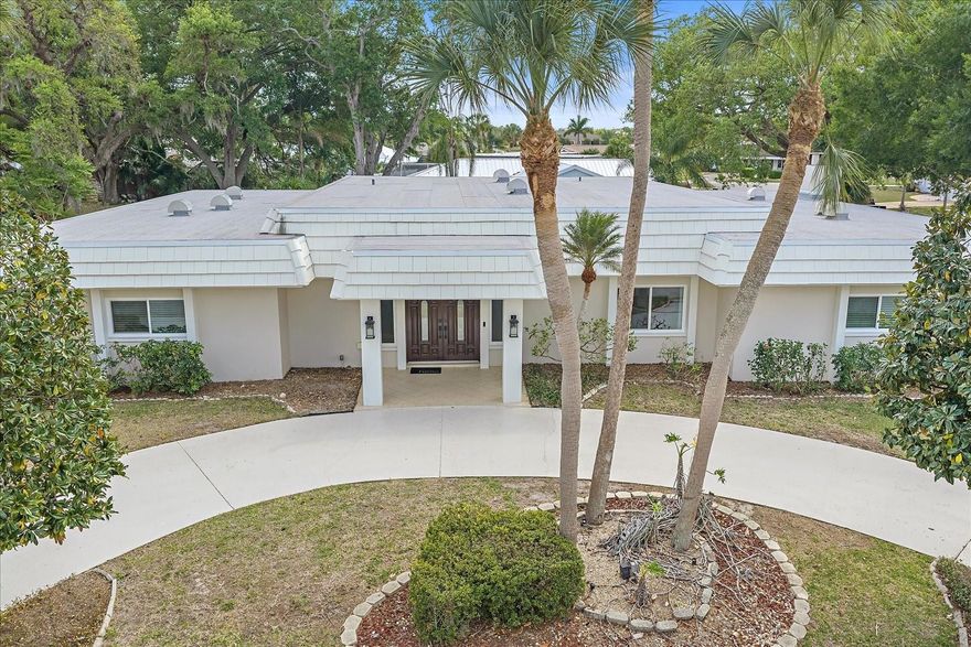 Pristine, private, and fully fenced, this beautifully updated pool home in central Sarasota is being offered for only the second time since it was built. Tucked on a quiet corner lot in the highly sought-after Forest Lakes Country Club Estates, this single-story masonry ranch sits on over one-third acre, southern pool exposure and an impressive elevation of about 16.7–20 feet. The residence offers four bedrooms, two-and-a-half baths, and 3,474 square feet under air, including 492 square feet of enclosed lanai living space. 

Inside, the home is designed for comfortable everyday living and effortless entertaining, with generously scaled rooms, abundant natural light, and a sprawling layout, a welcoming family room ... complete with a travertine wood-burning fireplace adjacent to the kitchen. A sunken formal living room adds architectural character, while expansive indoor and outdoor living areas provide flexibility for hosting family and friends. The oversized kitchen features granite countertops, soft-close wood cabinetry, stainless appliances, an island range with hood, pull-out pantry storage, and a black glass Samsung refrigerator with water filtration. A convenient pass-through window connects the kitchen to the enclosed lanai seating area, creating a seamless space for casual dining and entertaining while overlooking the pool and backyard.

Extensive updates throughout the home provide exceptional peace of mind. Major system improvements include a mansard built-up roof installed in 2019, hurricane-impact windows installed in 2025, a new AC system and ductwork in 2025, a new water heater in 2025, an updated electrical panel in 2021, and the replacement of original polybutylene plumbing with PEX plumbing in 2021. Interior upgrades completed in 2021 include vinyl plank flooring, upgraded plush carpeting, and renovated kitchen and bathrooms with quality cabinetry, granite surfaces, and stainless appliances.

The pool and outdoor living areas were thoughtfully renovated in 2025, featuring a new pool surface, sun shelf, bench seating, heater, pump, and saltwater system. The inviting outdoor space overlooks a private paver pool deck and fully fenced yard, creating a relaxing setting for enjoying Florida’s year-round sunshine. A separate concrete slab area offers additional flexibility for recreation such as basketball or other outdoor activities.

Additional features include recessed and dimmable lighting throughout, marble window sills, linen curtains, large closets including an oversized coat closet, and abundant windows and sliding doors that bring natural light into every room. The main hallway bathroom also functions as a convenient pool bath with direct access to the lanai area. Due to the extensive improvements made over the years, the property carries an effective year built of 2011.

Ideally located in the heart of Sarasota, the home is just minutes from The Palms Golf Club at Forest Lakes and Village Green Golf Club, the charming Pinecraft district and Yoder’s Restaurant & Amish Village, vibrant Downtown Sarasota, and the world-renowned beaches of Siesta Key, Lido Key, and Longboat Key. Everyday shopping and dining are also close by, including Costco, BJ’s Wholesale, and Sam’s Club. Forest Lakes Country Club Estates offers a voluntary HOA of just $60 per year. 

The prior owner removed the 4th bedroom closet (can easily be re added).
