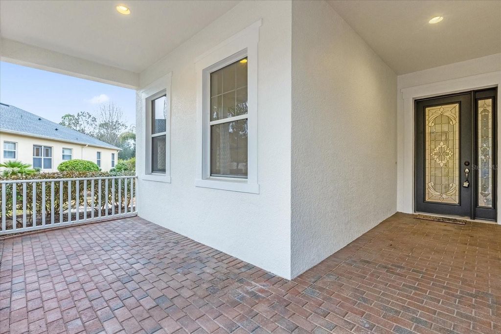 Photo of 103 Crescent Moon Drive, Groveland, FL 34736 (MLS # O6379856)