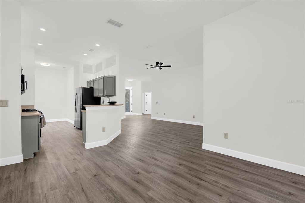 Photo of 103 Crescent Moon Drive, Groveland, FL 34736 (MLS # O6379856)