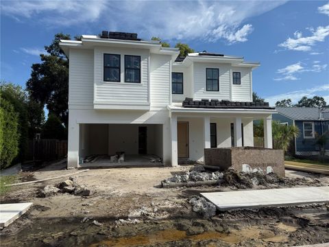 Photo of 1009 W Ohio Avenue, Tampa, FL 33603 (MLS # TB8341408)