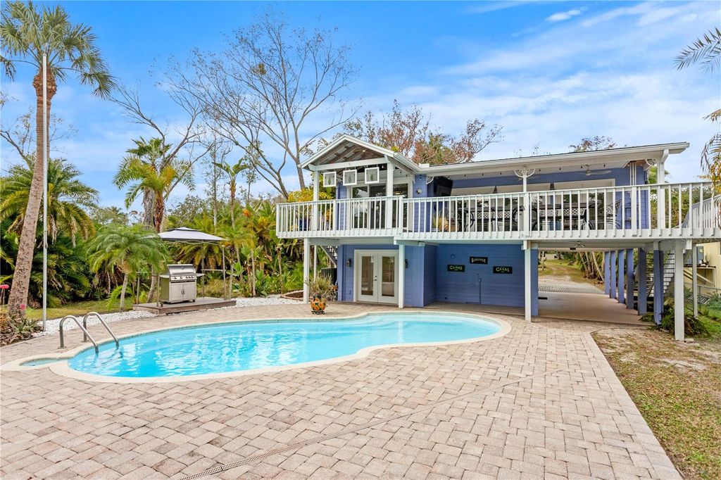 Photo of 906 W Henry Avenue, Tampa, FL 33604 (MLS # TB8469858)