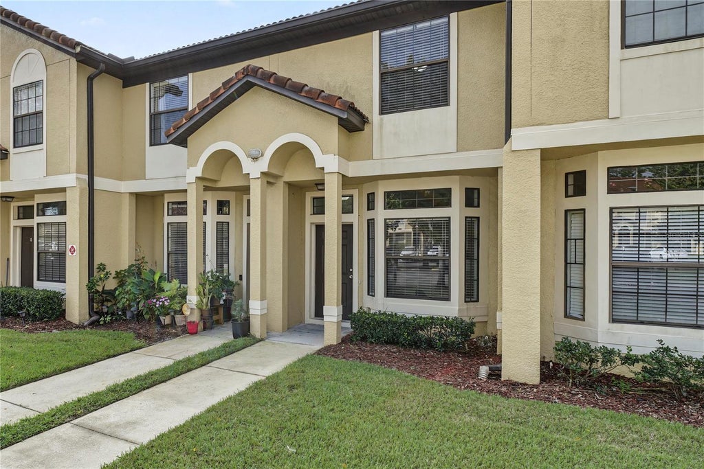Photo of 6013 Scotchwood Gln Gln #20, Orlando, FL 32822 (MLS # O6444801)