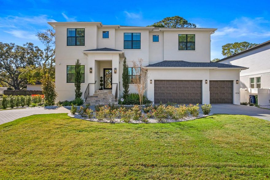 Welcome to a contemporary custom home in South Tampa that epitomizes luxury and sophistication. This stunning residence features a spacious open floor plan with 4 bedrooms, including a dedicated guest suite, a separate first floor office, 4 full baths, and 2 half baths. The kitchen is a culinary haven, boasting granite countertops and an inviting eat-in breakfast bar illuminated by modern pendant lights. Upstairs, the luxurious master bedroom offers an ensuite bath with dual vanities, an opulent shower with a rain shower head, and a soaking tub for ultimate relaxation. The sellers have converted one of the additional bedrooms into a deluxe dressing room, although it can easily be converted back into a traditional bedroom depending on your needs. Indoor and outdoor entertaining are effortless as the game room and lanai both have been equipped for seamless control of Smart TVs, landscape and pool lighting, speakers and subwoofers. Outside, a spacious yard and paver driveway complement the luxurious private pool and heated spa. This home offers the perfect blend of luxury, comfort, and convenience, situated just minutes from Downtown Tampa, Tampa International Airport, Hyde Park, restaurants, shopping, and sporting venues all while being located in the desirable Mabry, Coleman, Plant School District. Schedule your private tour today and experience refined living at its finest!