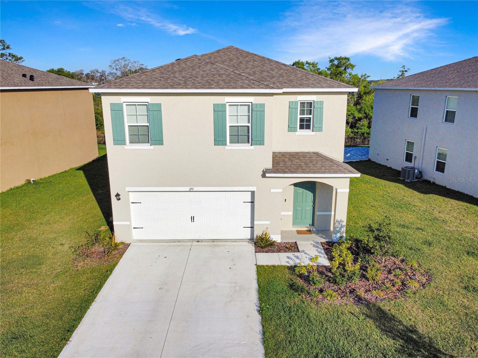 Discover this beautifully designed two-story residence located in Davenport, FL. Offering both functionality and style, this home features a spacious open-concept layout that creates a welcoming flow throughout the main living areas. The modern kitchen is equipped with stainless steel appliances, including a refrigerator, range, and dishwasher, and connects seamlessly to the combined dining and living space. Large sliding glass doors open to the rear of the home, allowing for abundant natural light.
The first floor also includes a well-sized bedroom and a full bathroom, providing flexibility for guests or additional living arrangements. Upstairs, the primary suite offers a generous walk-in closet along with an en-suite bathroom that includes dual vanity sinks and a private water closet. Additional bedrooms and bathrooms are positioned to maximize both comfort and convenience.
A two-car garage provides ample storage and parking, while the backyard benefits from no rear neighbors, enhancing privacy. The community further enhances the lifestyle with amenities such as a swimming pool and soccer field. Positioned near Highway 27, this property allows quick access to local shopping, dining, and entertainment options.
This residence presents an excellent opportunity for those seeking comfort and convenience in a desirable Davenport location. Schedule your showing today!