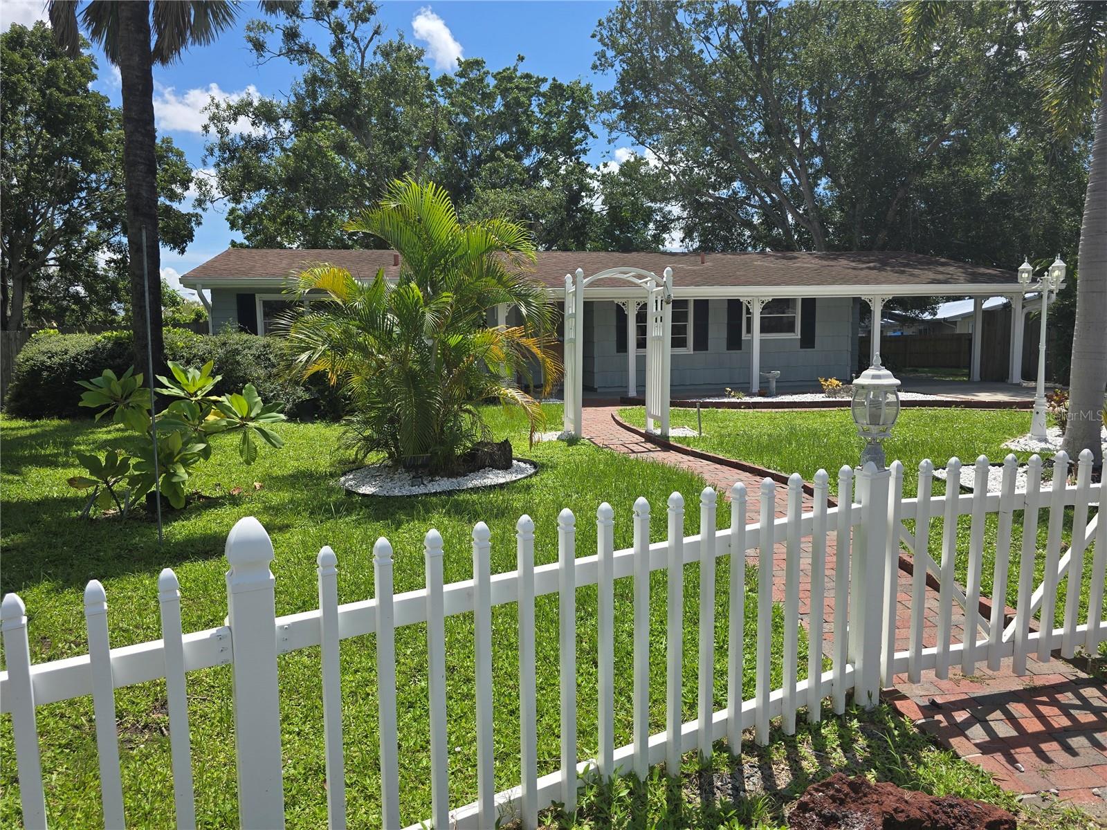 Annual unfurnished rental: Step into tranquility with this outstanding Sarasota home, nestled under a canopy of mature trees on a quarter acre of lush tropical-scaping on charming cul-de-sac. Featuring 3 bedrooms & 2 baths, the open spaces are so versatile depending upon your needs. Thoughtfully and beautifully remodeled, the heart of this home is undoubtedly its chef's kitchen, including new stainless-steel appliances, quartz counter tops, a deep farm sink, and ample seating for guests at the counter. Plenty of built in storage it’s just perfect for hosting friends or enjoying family meals. Retreating to your spacious master ensuite with spacious walk-in-closet and gorgeous bath - you’ll fall in love with the floor-to-ceiling tile that will transform your shower into a refreshing start to the day. Second bedroom features natural light and two large sliding door closets. Guest bath is luxurious – perfect sanctuary for relaxation including a deep soaking tub. But that's not all! A generous third bedroom with its own private entrance, offers endless possibilities…whether you envision a bedroom, office, or family room with entry to the screened lanai with hot tub. For the boating or RV enthusiast, there’s ample storage to accommodate in fenced area. Pets are welcome with non-refundable pet fee, proof of Vet records and prior owner approval. Background check required. Home comes with lawn care twice monthly. No smoking is permitted. It won’t last long, call today to schedule showing.
