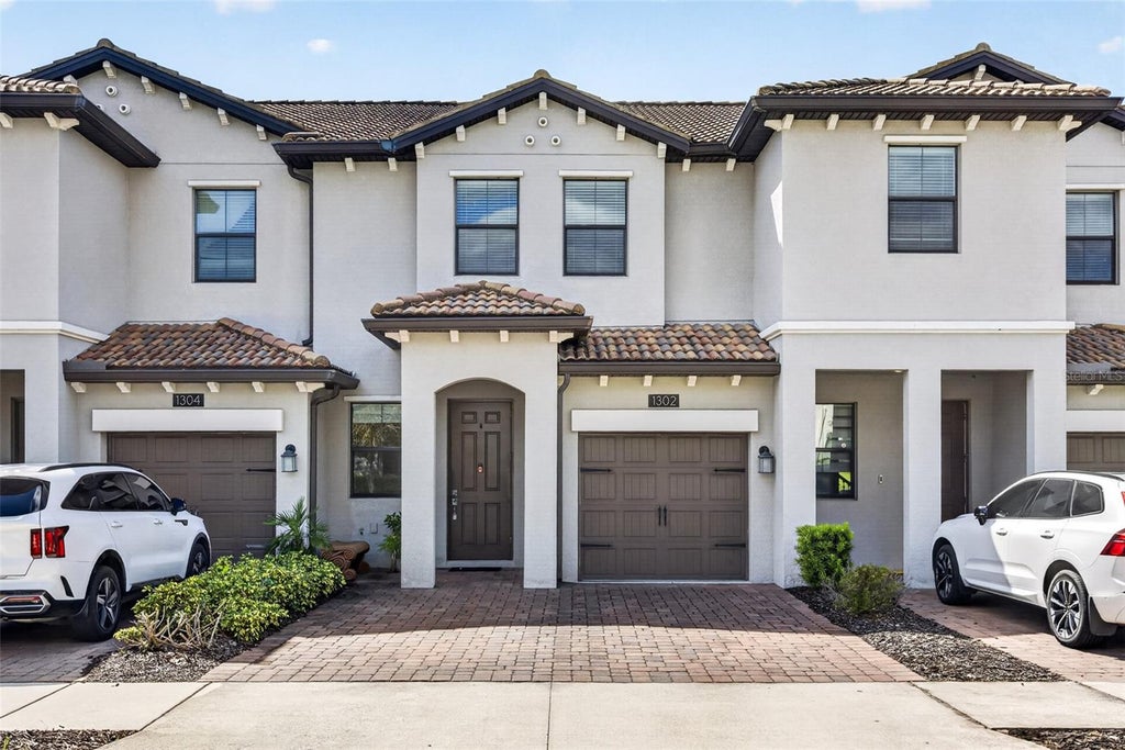Photo of 1302 Royal St George Boulevard #1302, Davenport, FL 33896 (MLS # O6451430)