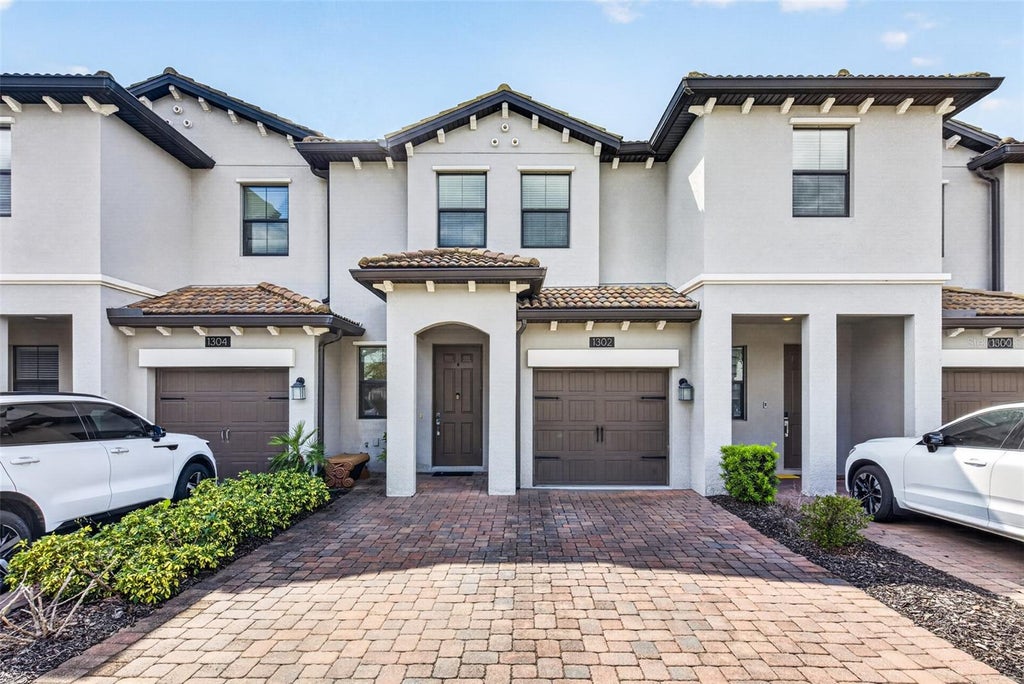Photo of 1302 Royal St George Boulevard #1302, Davenport, FL 33896 (MLS # O6451430)