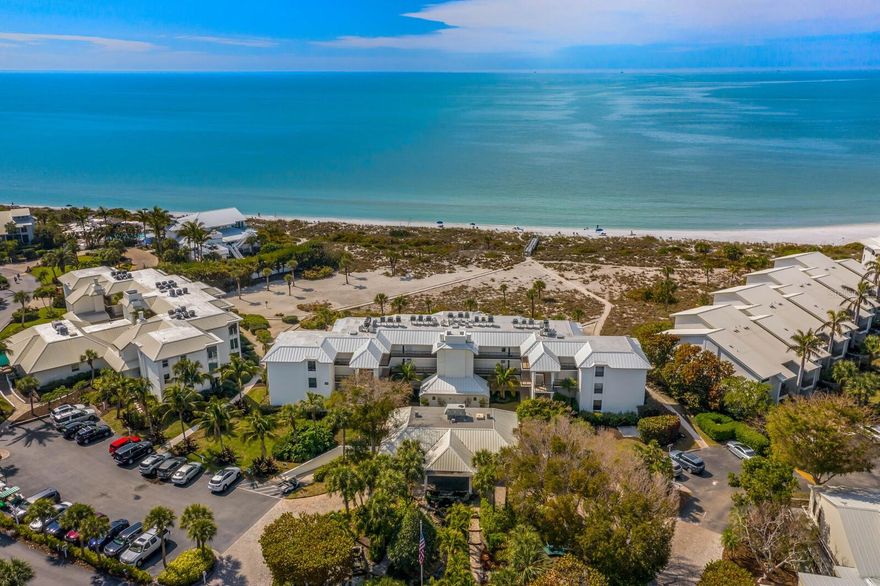 Admire the gorgeous Gulf of Mexico views from this desirable beachfront, one bedroom two bathroom condo in the Boca Grande Club, a private, gated beachfront community. This beautifully renovated second floor condo with elevator access features a redesigned kitchen featuring white cabinetry, a stunning granite countertop and stainless steel appliances.  The owner suite has fabulous gulf views and enlarged bathroom featuring double sinks and additional storage cabinets. The glass enclosed lanai provides extended living space with large impact sliders and a living room picture window enhances the stunning sunset views.  Offered fully furnished with a coastal ambiance, it is the perfect retreat for relaxing and peaceful island living.  Located close to all the luxurious amenities of the Boca Grande Club including: a recently renovated gulf front restaurant and Tiki bar, three swimming pools, state of the art fitness center, fitness classes, 8 tennis courts and player clinics. Please inquire for membership details and cost.