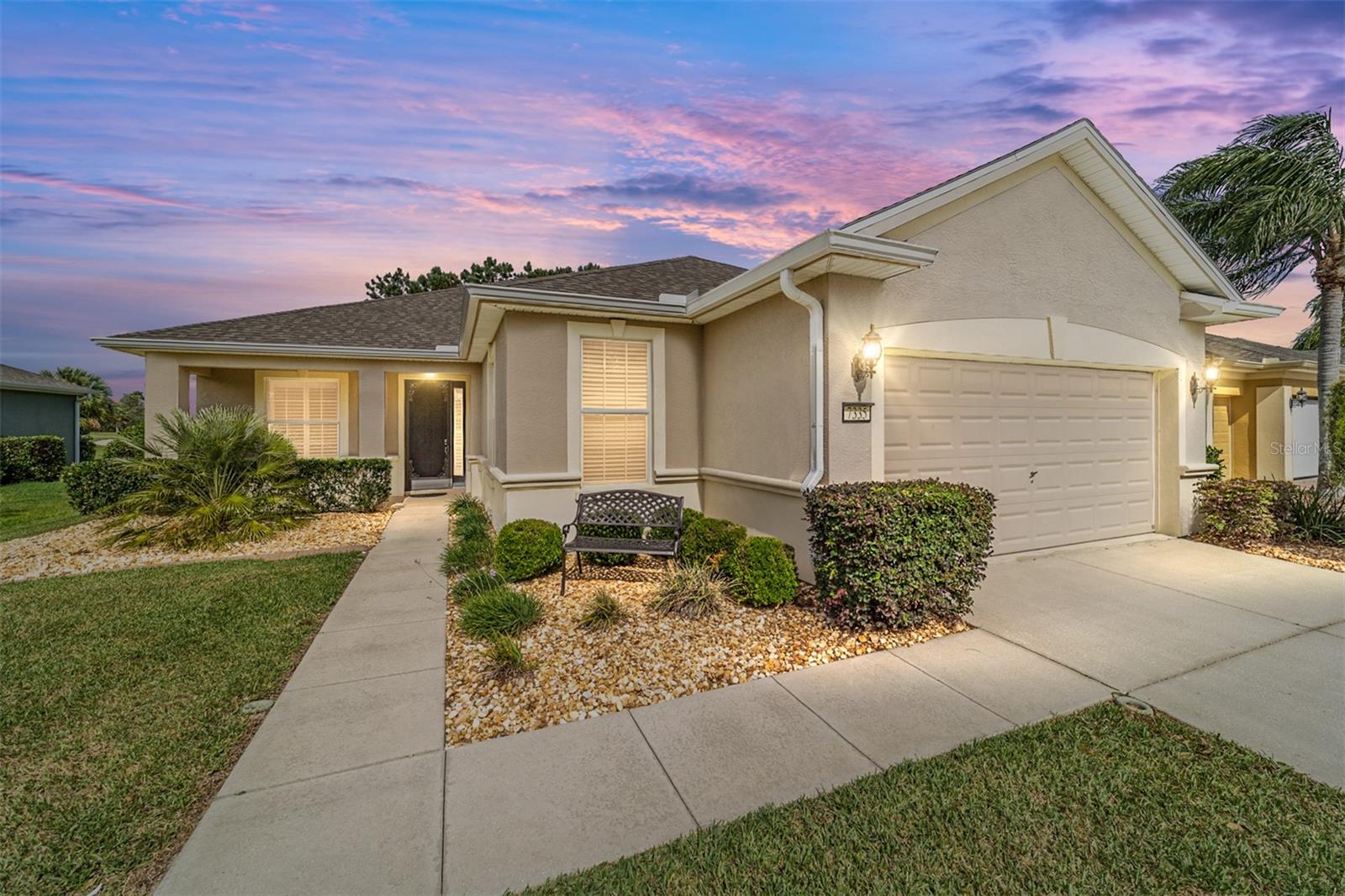 GORGEOUS GOLF COURSE VIEWS! This Shenandoah model, located in Stone Creek by Del Webb, features two bedrooms, two bathrooms, a flex room, and a 2-car garage with additional space for a golf cart. This lovely home has many desirable features. The main areas and bathrooms feature elegant tile flooring, while the primary bedroom and a flex room have LVP flooring. The kitchen was upgraded in 2023, featuring a spacious island perfect for dining, as well as a stunning quartz countertop, a trendy backsplash, modern stainless steel appliances, and recessed lighting. The gathering room includes a ceiling fan and built-in surround sound, making it the ideal spot for entertainment. The primary bathroom is upgraded with a new tiled walk-in shower, quartz countertops, and new sinks and faucets.
The guest bedroom boasts a ceiling fan for added comfort. The guest bathroom is spacious and features a tub, vanity, and other amenities. The flex room is stylishly appointed with glass French doors, a ceiling fan, and a custom Murphy bed and desk unit. The laundry room is well-equipped with upper cabinets, a sink, a separate folding counter, and a washer and dryer. The lanai, featuring a ceiling fan, automatic remote-controlled shades, and CAT 3 sliding windows, offers gorgeous views of the golf course. Some other notable improvements include a new roof installed in November 2023 and a top-of-the-line 4-ton A/C system with an impressive 18 SEER rating, installed in May 2017. A new hot water heater installed in 2022.
Additionally, the property features a water softener, blown-in insulation over the garage and lanai, and an insulated garage door. The landscaping has also been thoughtfully elevated. Don't miss out on this opportunity, give us a call now to arrange a private tour.