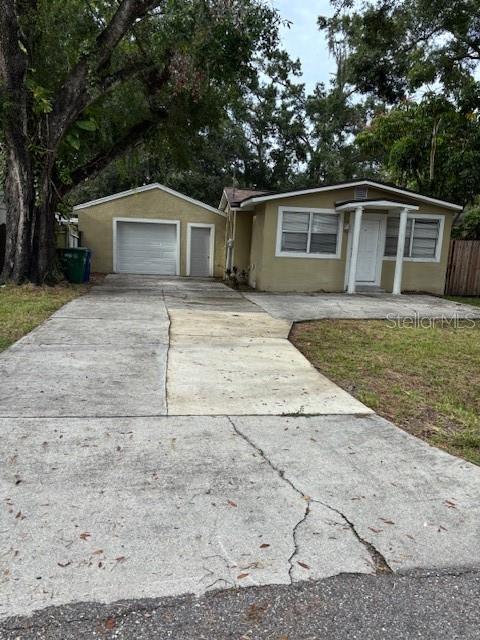 BEAUTIFUL 2 BEDROOMS, 1 BATHROOM HOME WITH A 1 CAR GARAGE LOCATED IN TAMPA AND ONLY 1 BLOCK AWAY FROM THE HILLSBOROUGH RIVER. ALSO, THIS HOME HAS A VERY SPACIOUS AND FENCED BACKYARD FOR PRIVACY. THE WATER HEATER WAS RECENTLY INSTALLED. THERE'S A WELL IN THE BACKYARD AND IT HAS A WATER SOFTENER SYSTEM IN THE GARAGE THAT'S OWNED BY THE SELLER. THE EXTENDED DRIVEWAY CAN ACCOMODATE SEVERAL VEHICLES. THIS HOME CAN BE A FIXER UPPER AND CAN BE USED FOR AIRBNB OR AN INVESTMENT PROPERTY SINCE IT'S LOCATED ONLY A SHORT DRIVE AWAY FROM BUSCH GARDENS. ALSO, CENTRALLY LOCATED CLOSE TO UNIVERSITY OF SOUTH FLORIDA, UNIVERSITY MALL, MAJOR HIGHWAYS, SEVERAL HOSPITALS, RESTAURANTS AND DOWNTOWN TAMPA.