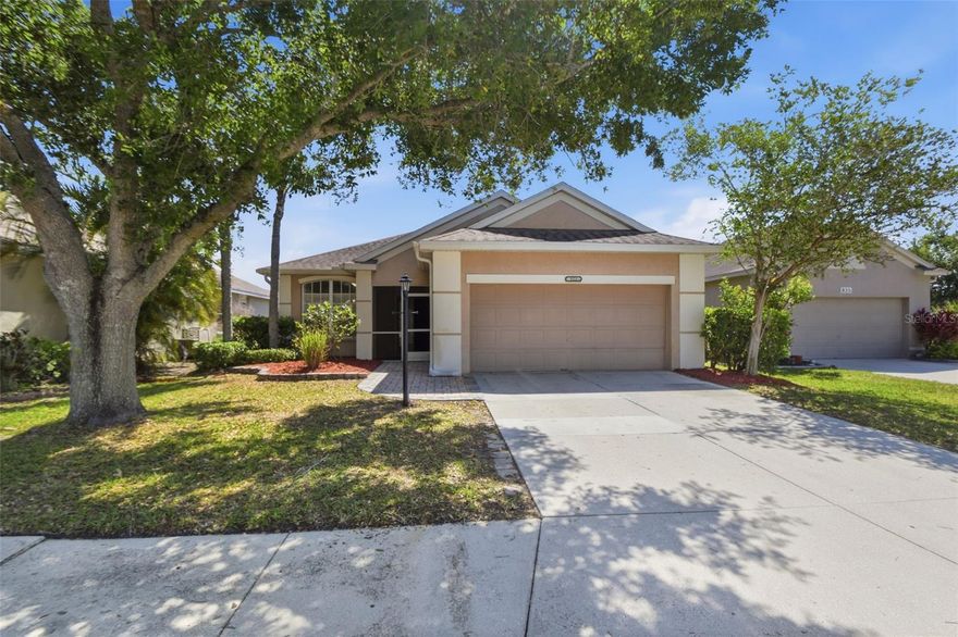 One or more photo(s) has been virtually staged. Welcome to this well-kept single-family home in the established Greenfield Plantation area of Bradenton. Offering a comfortable and functional layout, this residence features an inviting living space that flows easily into the kitchen and dining areas, creating a practical setup for everyday living and entertaining. The home includes three bedrooms and two full bathrooms, with a layout designed for both privacy and convenience.
Natural light fills the interior, while the surrounding neighborhood provides a peaceful residential setting with mature landscaping. A two-car garage and thoughtfully designed floor plan add to the home’s overall appeal. Conveniently located near shopping, dining, parks, and major roadways, this property offers easy access to Lakewood Ranch and surrounding areas.