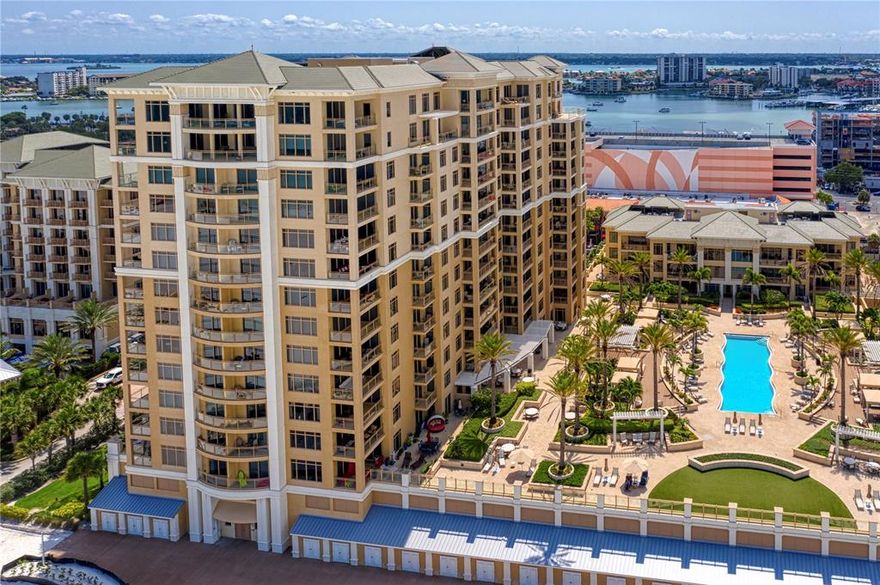 It's not just the sunsets and pure clean sand beaches, although those are spectacular on Clearwater Beach.  It's the ability to enjoy those natural joys from your own personal retreat in the luxurious Sandpearl Residences.  Rarely does a property like this come along, boasting upgrades such as travertine flooring throughout the residence, the finishing touch of crown molding, the ease of electric shades on the great room, kitchen, dining room, and master bedroom windows.  Mirrors enhance the impact of the entryway as well as give outside views from all angles, and even the bathing experience is lifted with upgraded showers.  Newer Air Conditioning units as well as newer washer and dryer will ensure peace of mind for years to come.  Enjoy all that the newly renovated Sandpearl Residences has to offer including beach view ozone purified pool and hot tub, outdoor grills, billiard room, fitness center with sauna and steam, community room, assigned covered parking, 24 hour concierge/security, even Room Service from the world famous Sandpearl Resort just next door.  You deserve to own your special paradise, so take advantage of this opportunity in the short time that it will be available!