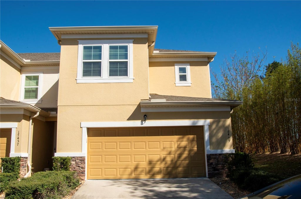 Photo of 17459 Chateau Pine Way, Clermont, FL 34711 (MLS # O6414546)