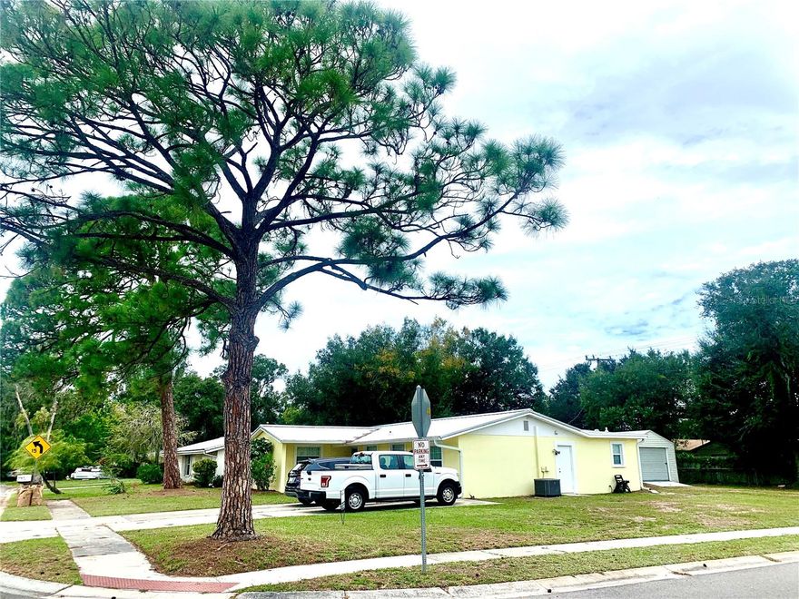 Well established family neighborhood is in a great school district. This is essentially the middle of our town of Sarasota, close to Siesta Key gulf beaches, restaurants and shopping with easy access to Interstate I75. This split plan 3 bedroom 2 bath is on a large corner lot and has tons of natural light. kitchen and baths have been completely remodeled with stone counters and ceramic accent tile. Stainless steel appliances are featured in this large galley kitchen, with room for table. Bonus room off from the kitchen could be used as office/den, or even separate living area or 4th bedroom if needed. Washer and dryer included and there is a generous utility and storage space under air. Additionally, there is a breezy screened- in lanai area. Owners have left a portable garage for tenant's use. Separate shed is on property that the owners use to store things. Pest control and lawn care included.