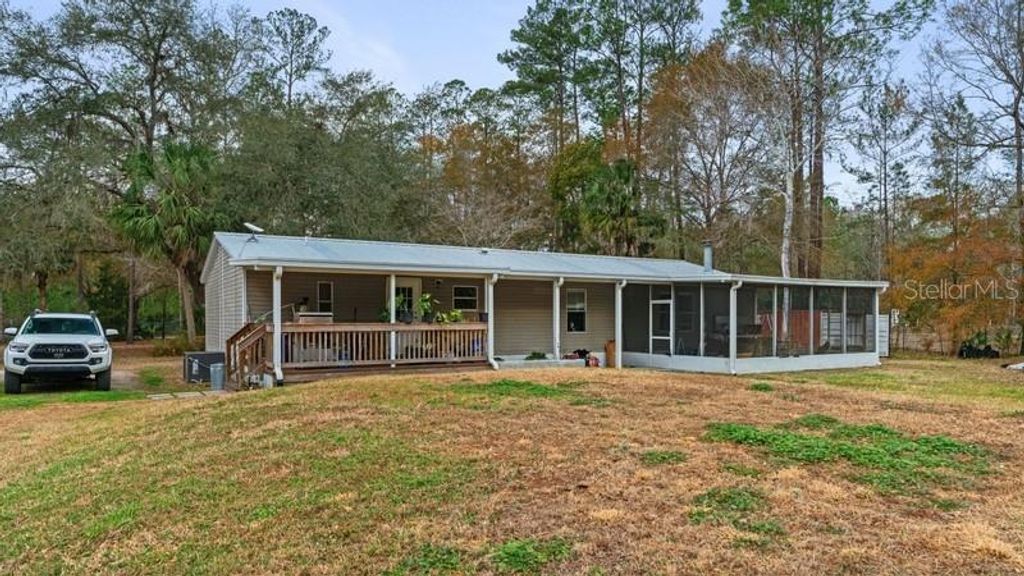 Photo of 10937 SE 24th Street Road, Silver Springs, FL 34488 (MLS # O6383091)