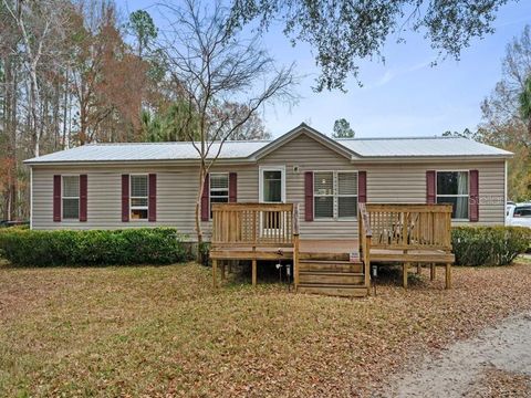 Photo of 10937 SE 24th Street Road, Silver Springs, FL 34488 (MLS # O6383091)