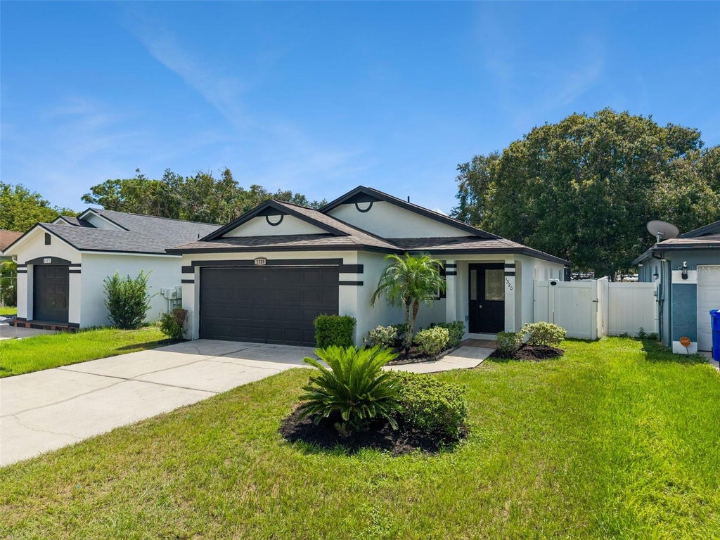 Photo of 1320 Oak Grove Court, Kissimmee, FL 34744 (MLS # O6441949)