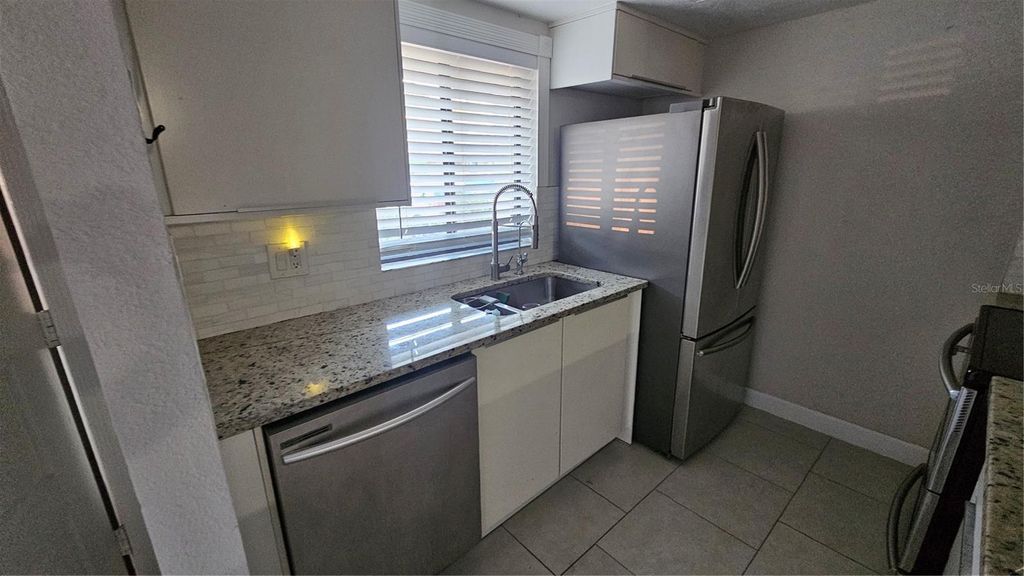 Photo of 3918 Oak Limb Court, Tampa, FL 33614 (MLS # TB8455534)