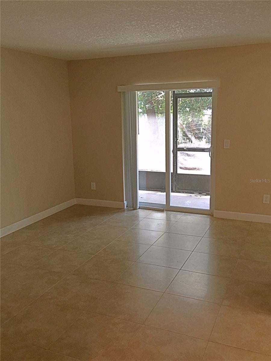 Photo of 9911 Turf Court #6, Orlando, FL 32837 (MLS # S5159640)