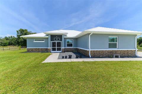 Photo of 40200 Little Farm Road, Punta Gorda, FL 33982 (MLS # OM726399)