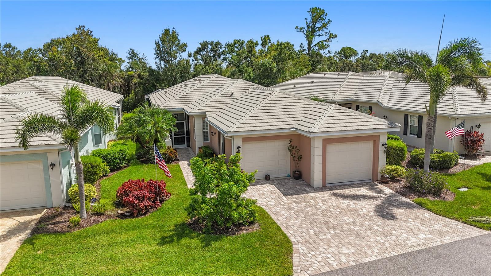 Enjoy the ease of condo-style living in this rarely available freestanding villa with a private pool in St. Andrews East. This is not your typical condo—this detached patio home lives like a single-family house but with full exterior maintenance included. The quarterly fee covers exterior insurance (drywall out), wind coverage, roof reserves, painting, lawn care, pest and termite protection, discounted high-speed internet, two pools, a resident-run clubhouse, and full community management—everything you need for truly carefree living. There’s no CDD, and optional membership at Plantation Golf & Country Club unlocks golf, tennis, fitness, dining, and more.
This pool home is a standout, offering a serene preserve view, full privacy, and a covered lanai with a mounted TV you can watch from the pool. Storm-ready with impact Hurricane windows and remote controlled roll-down Hurricane shutters for the lanai, the home is filled with upgrades: crown molding, tray ceilings, plantation shutters, designer fans, central vacuum, security system, built-ins, and tile throughout. The kitchen features custom cabinetry, granite counters, stainless steel appliances, a breakfast nook with bay window, and a walk-in pantry. The primary suite includes direct pool access, double walk-in closets, dual sinks, and a Roman shower. A smart split layout gives guests privacy with a Jack-and-Jill bath setup, and one bedroom features an oversized walk-in closet and the other currently used as a den/study.
The two-car split garage includes an epoxy floor, and one bay has been transformed into a climate-controlled studio—perfect for hobbies, art, or easy conversion back to parking. Minutes from beaches, Wellen Park, the Braves Spring Training facility, and I-75, this villa blends luxury and location with low-maintenance perks.