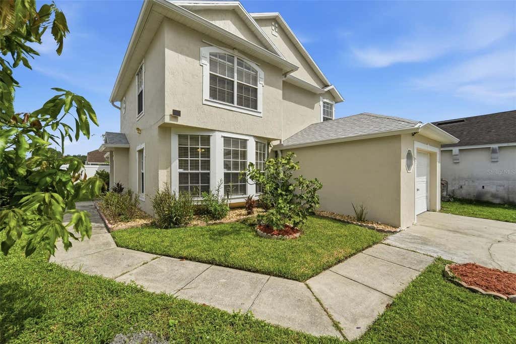 Photo of 2411 Parsons Pond Circle, Kissimmee, FL 34743 (MLS # O6432819)
