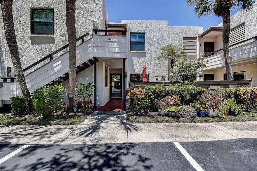 Welcome to this charming 2 bedroom, 2 bathroom condo offering the perfect blend of comfort, style, and Florida living. Nestled on a serene private lake with a beautiful fountain at its center, this home provides peaceful views and a relaxing atmosphere from the moment you arrive. The exterior has a fresh new paint job, and the unit includes its own private covered parking space for your convenience.
Inside, you’ll be impressed with the wide open floor plan and newer luxury plank vinyl flooring that runs throughout most of the unit. The kitchen features real wood cabinets, beautiful Corian countertops, and a built-in bar area with plenty of extra cabinets for storage. An inside washer and dryer make day-to-day living even easier.
The large primary suite is a true retreat with a spacious walk-in closet, double sinks with his and hers mirrors, and a stand-up shower. At the back of the condo, the sunroom offers ceramic tile flooring and walls of windows that let in plenty of natural light as you sit and unwind while enjoying tranquil lake views and the soothing fountain.
For those who love the outdoors, the unit includes a large storage room perfect for bicycles, allowing you to easily ride to the sandy Florida beaches located just minutes away. The private front sitting area offers another quiet spot to relax while listening to the birds chirp and watching squirrels at play.
Conveniently located near an abundance of restaurants and shopping malls, this condo combines comfort, convenience, and natural beauty in one desirable package. Don’t miss your chance to make it yours—this one won’t last long at such an amazing price!