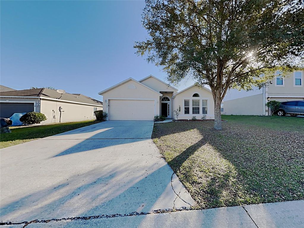 Photo of 744 Lobelia Drive, Davenport, FL 33837 (MLS # TB8461113)
