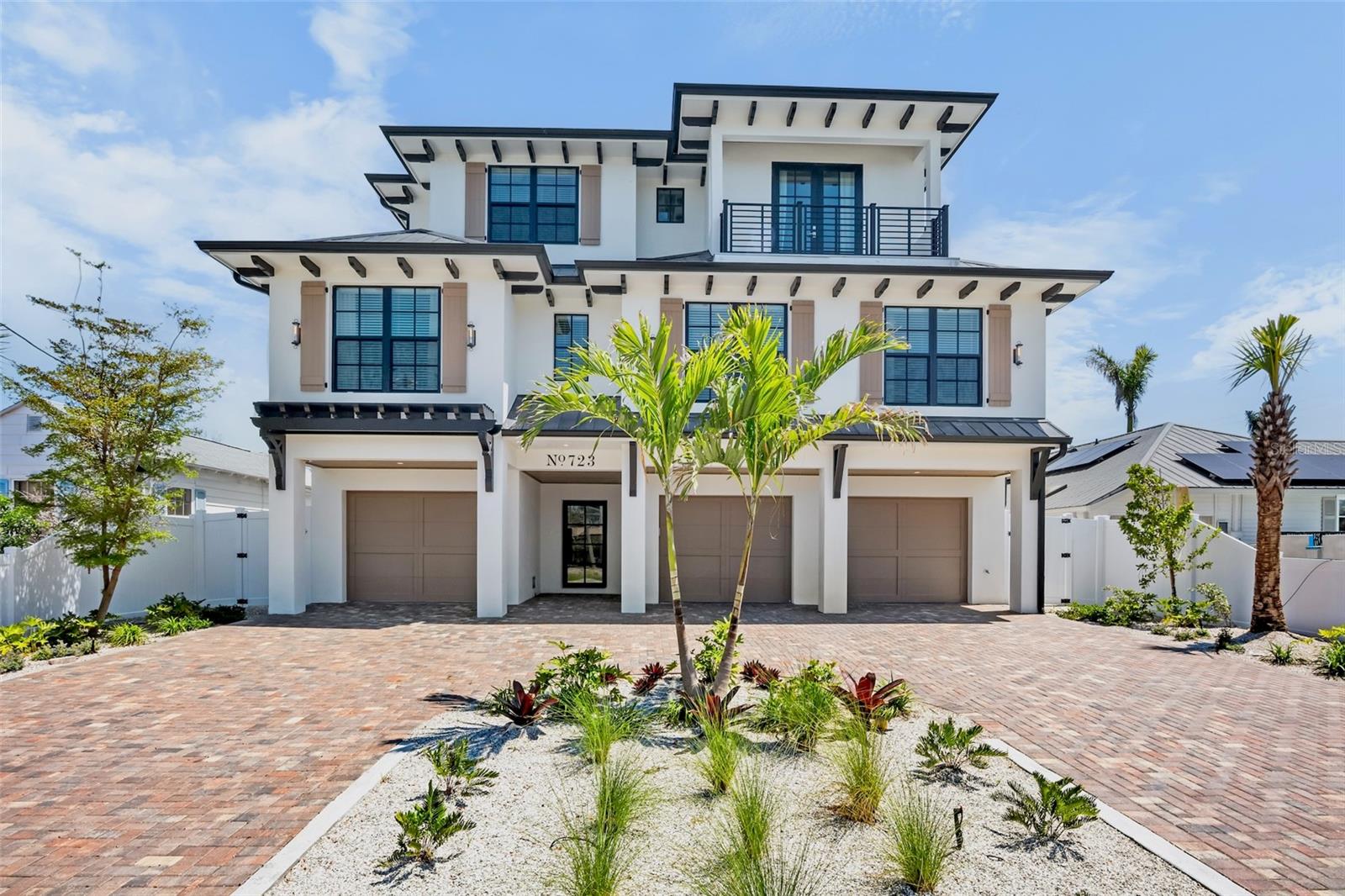 IN A WORD STUNNING! Coastal, Modern, Bright and Airy. This home has everything you could possibly want in a fabulous location near the World Class shopping and dining of St Armand's Circle and Lido Key Beach. This 6-bedroom 61/2 bath property is TURNKEY
FURNISHED, has an elevator, and boasts an outdoor living space of your DREAMS! No expense was spared on this home with high end designer finishes and attention to detail, so every space is perfectly curated to create an ambiance of refined, relaxed
sophistication. The chef’s kitchen features top-of-the-line appliances, gorgeous custom cabinets and built ins, oversized island with waterfall quartz top and room for everything to entertain from food prep to a cocktail and wine station. The Open Concept floor plan flows
seamlessly to a beautiful dining and living area that extends to an outdoor covered balcony to transition to the open air. Retreat to the luxurious primary suite, complete with a spa-like ensuite bathroom featuring a soaking tub, oversized shower, dual vanities, and spacious
walk-in closet. A second bedroom with private bath and a powder room are also on the main level. Upstairs you will find 4 more guest suites all with private baths and a 2nd living room with covered balcony providing the optimum level of comfort and privacy for your
guests. But don’t get too comfortable before you make your way to the roof top deck for spectacular views of the water and skyline at sunset. Saving the best for last and this will surely to be one of your favorite features of this fabulous beach home. The backyard oasis
is fun and playful and looks like something out of Palm Springs. Step outside to a gorgeous pool with built in slide, oversized hot tub, and spacious lounge area, outdoor shower surrounded by low maintenance turf. The colors and feel just make you happy to be there.
This one is so darn special! Book your private showing today!