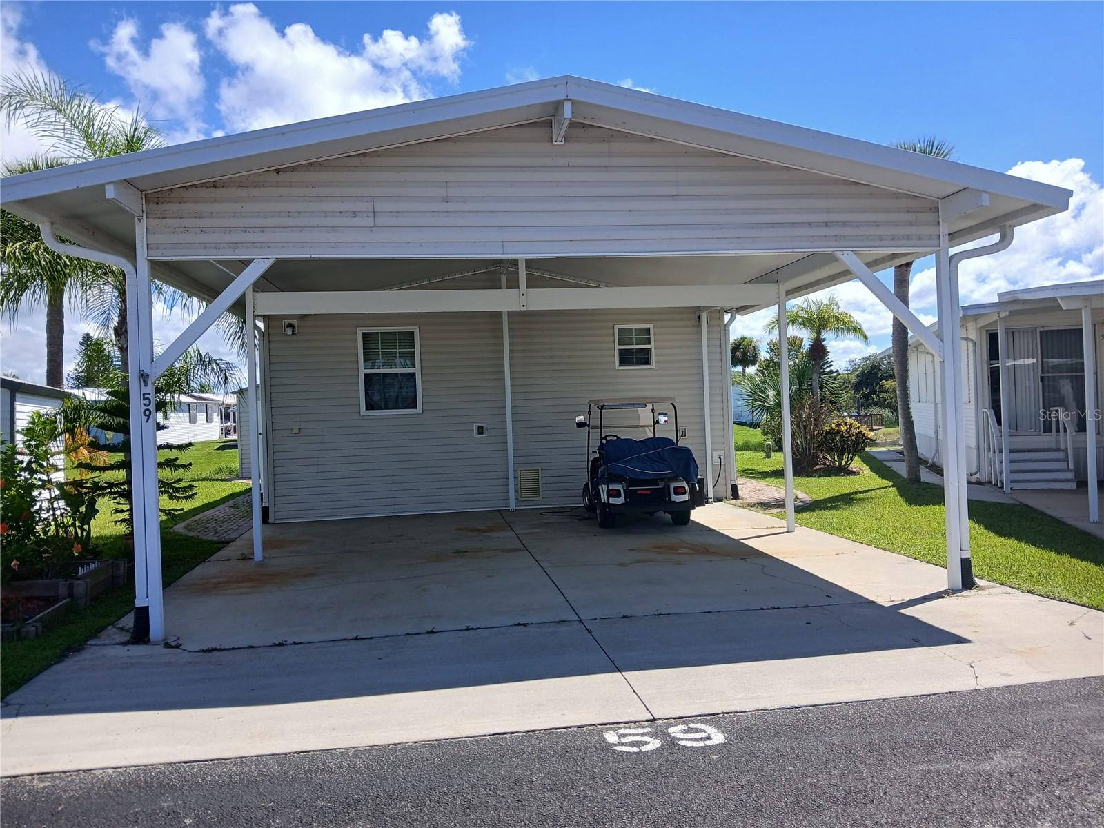 Blue Cypress Golf & RV Resort 55+ community. Enjoy this 2 Bedroom 2 Bathroom Park model that has an attached porch that overlooks the water. Bring your boat because there is a community boat ramp a short distance away. Play golf, enjoy the pool, or ride your golf cart and take advantage of the Clubhouse that offers many activities throughout the year. Come See!