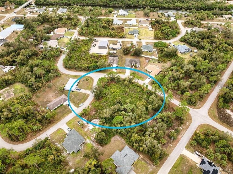 This OVERSIZED CORNER lot is located in the rapidly growing city of North Port. Whether you're looking to build your dream home, expand your investment portfolio, or enjoy a piece of Florida's natural beauty, this lot offers endless possibilities. Situated in a peaceful, residential neighborhood, this lot boasts excellent potential! Close proximity to I-75, stunning Gulf Coast beaches, shopping, dining, and recreation. Don?t miss out on this exceptional opportunity! North Port is one of Florida's fastest-growing cities, offering the perfect combination of affordability, convenience, and quality of life. With a strong sense of community and a wide range of amenities, it?s a great place to live, work, and play. The city is also home to the North Port Aquatic Center, Atwater Community Park, and many other recreational spots for residents and visitors alike. Boundary survey available upon request.