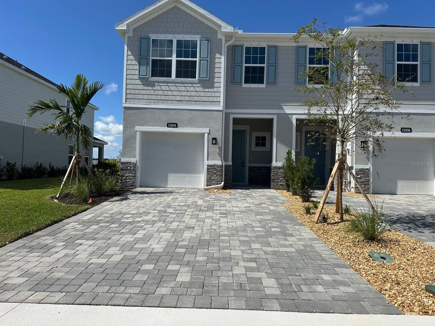 Brand new corner townhome for lease in the beautiful Amber Creek community in Lakewood Ranch! This spacious 3-bedroom, 2.5-bath home offers 1,674 sq ft of modern living space, featuring a 1-car garage plus a 2-car driveway. The open-concept kitchen boasts quartz countertops, stainless steel appliances, and ample cabinetry. Enjoy stylish tile flooring on the first level and cozy carpet upstairs. All bedrooms and the laundry room (washer & dryer included) are conveniently located on the second floor. Amber Creek is a beautifully maintained community offering fantastic amenities and access to top-rated A schools. Don’t miss this opportunity to live in one of the most desirable areas in Lakewood Ranch!