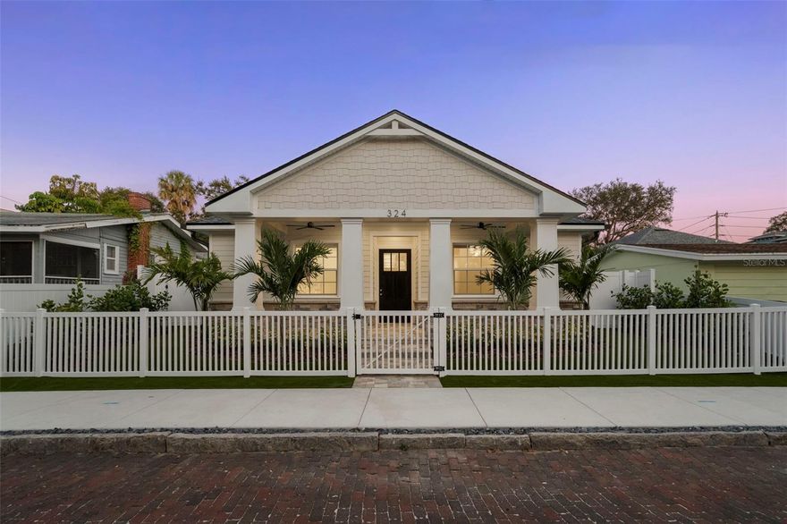 THIS BRAND NEW CONSTRUCTION  4 BED, 3.5 Bath with 3 CAR GARAGE pure luxury home is truly a RARE FIND IN DOWNTOWN SAFETY HARBOR   This location is 2 BLOCKS FROM MAIN ST AND THE SAFETY HARBOR SPA- perfect for strolling to restaurants and all the amenities on Main St.  IT’S A TRUE LUXURY HOME just waiting for you to enjoy EVERYTHING the Tampa Bay area and Safety Harbor has to give. NO FLOOD ZONE, hurricane impact windows, spray foam insulation and outdoor kitchen are just the tip of the iceberg!
As you approach the gated entrance and large front porch with its custom stone accents perfect for sitting and relaxing, you will immediately notice the professional landscaping and maintenance free turf package that gives this home tons of curb appeal.  Also very evident will be the quality workmanship and pride of ownership that is part of everything this home offers.  Upon opening the inviting front door, you will be drawn into the open floorplan of the inviting main living space including the large dining area, a wet bar that boasts an icemaker and a wine fridge, and a HUGE kitchen island that seats 6 is so perfect for ENTERTAINING!  This home is equipped with 3 kitchens. The main Chef’s kitchen is outfitted with a 36” Kitchenaid top of the line gas cooktop and Kitchenaid Double Wall Oven.  The countertops and full backsplash are the trending Taj Mahal Quartzite. Also included is a spectacular range hood, solid wood -soft close cabinets, upgraded dimmable undercabinet lighting. The upper cabinets have glass doors with custom lighting. The second kitchen or scullery is a true home cooks dream. Tucked away from the rest of the home it’s a space that is private and provides a way to have a “working kitchen” while if you desire, keeping the main kitchen pristine on a day-to-day basis. The third kitchen is in the screened lanai and features a full large sink, bar refrigerator, granite countertops and a Blaze Grill including a hood vent. The Primary Suite of this home is amazingly designed and decorated including a walk-in closet and separate makeup vanity.  The luxurious primary bath includes a large stunning shower & soaking tub, 2 separate large vanities with abundant storage, and a private water closet.  You will truly feel like you live at a spa every day!  
There are truly too many custom features to list!
DEFINETLY A MUST SEE, don’t wait this one won’t last!!