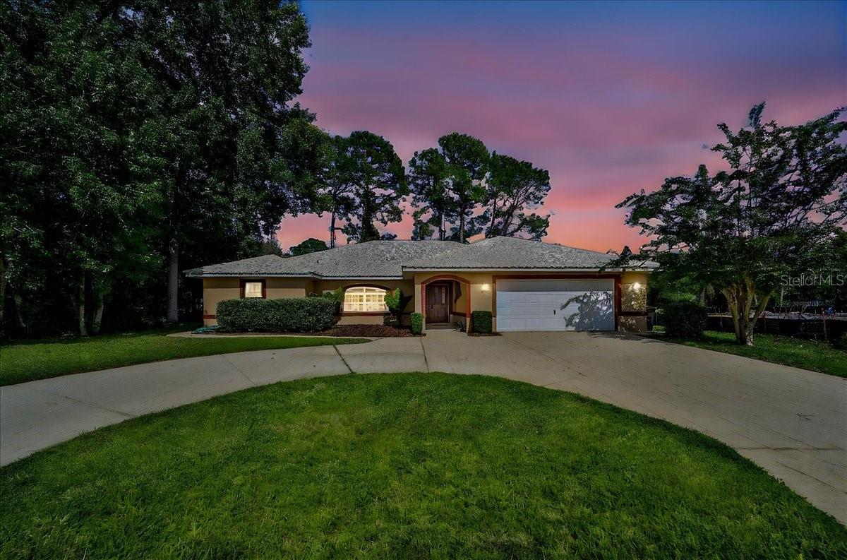 Discover the charm of 57 Woodhollow Dr, a stunning custom-built pool home by Amaral Builders that has been meticulously updated in the last six months. This beautiful residence boasts a brand-new, chef-inspired kitchen featuring high-end finishes and abundant counter space, perfect for culinary enthusiasts. The home is adorned with numerous upgrades, including a durable barrel tile roof with a lifespan of over 50 years and an expansive in-ground swimming pool, complemented by a large covered patio ideal for entertaining guests. Inside, you'll find two spacious living areas, a cozy wood-burning fireplace, and an indoor laundry room for added convenience. The property also features a large circular driveway, offering ample parking space for multiple vehicles. Situated in a prime location in Palm Coast, this home is just a 3-minute drive to one of the area's top golf courses and minutes away from all the amenities that Palm Coast has to offer. Don’t miss out on this incredible opportunity—call today, as this home won’t be on the market for long!